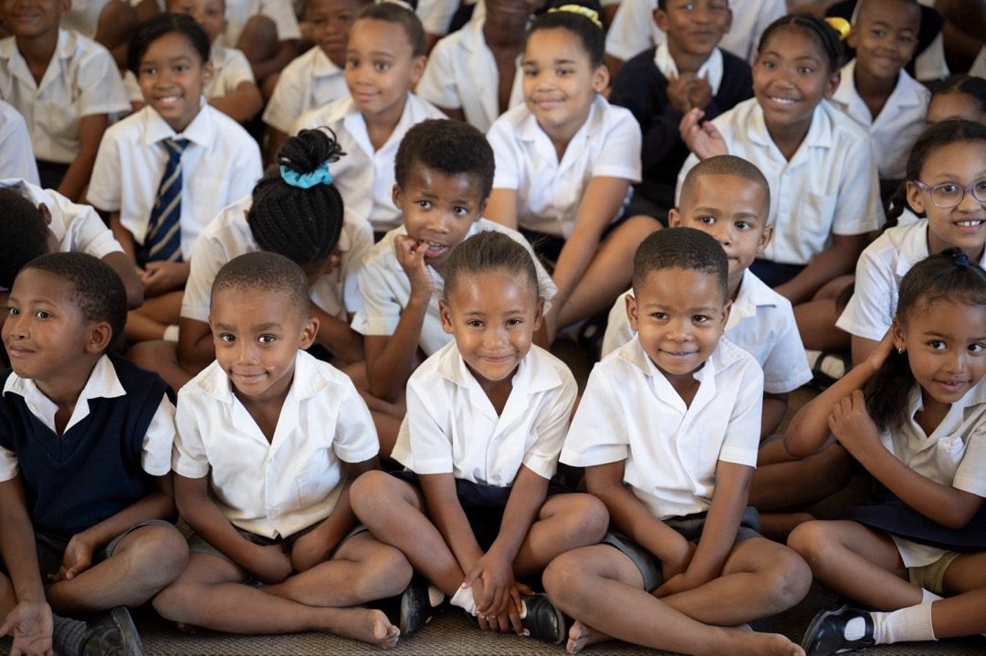 Learners at Little Stars Preschool sitting together